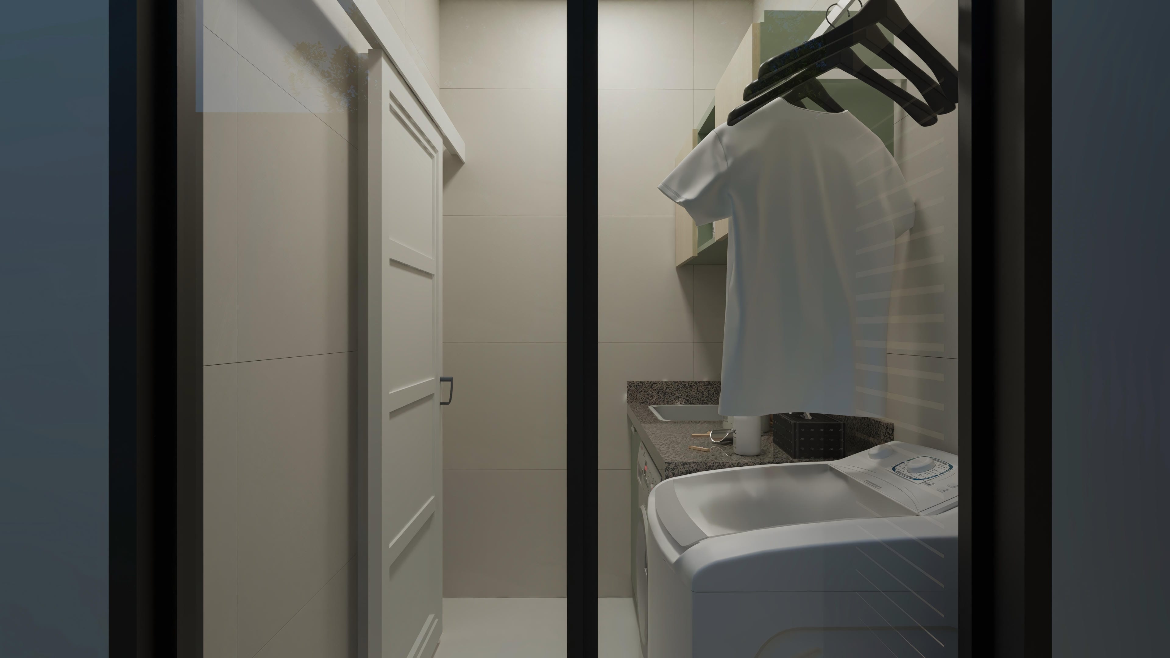 Detail of a white sliding door with grooves, in an environment with neutral-toned walls and a granite countertop with a washing machine.