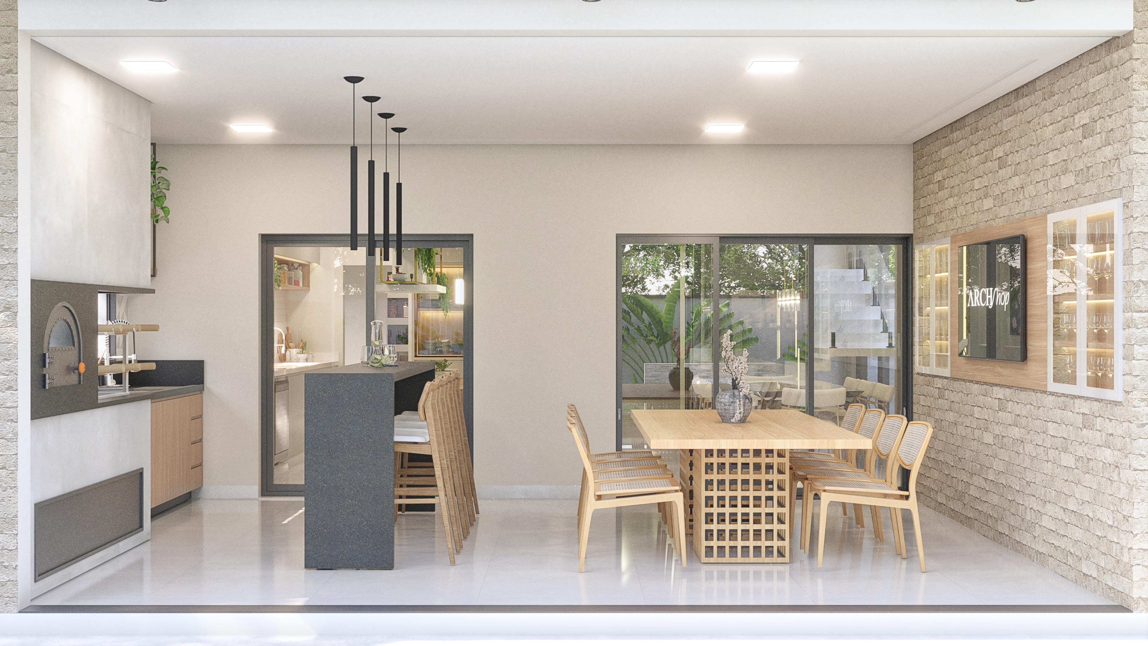 Espacio integrado con área gourmet, mostrador, mesa de comedor y sala de estar, con vistas a la zona exterior.