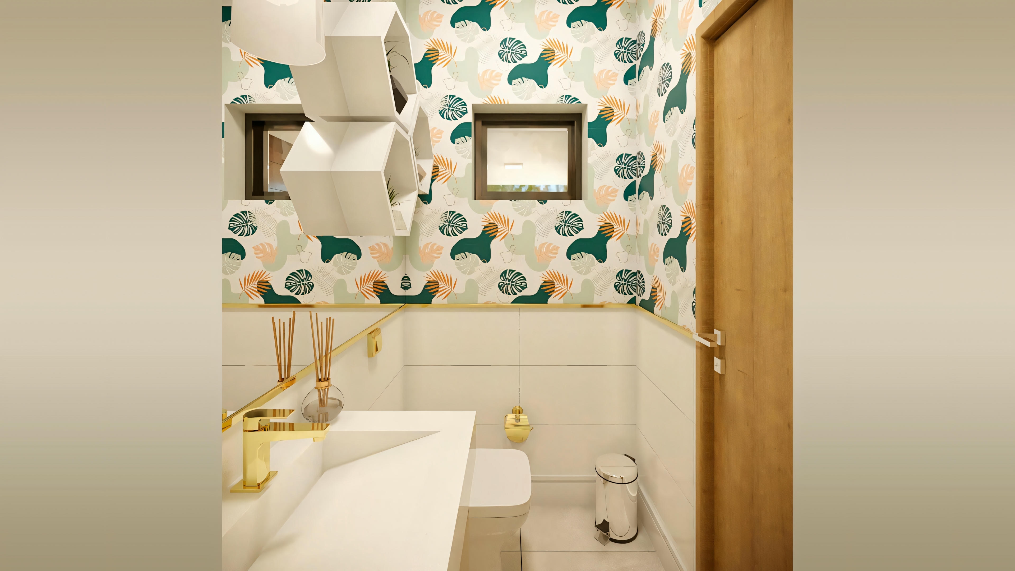 Un baño moderno con paredes blancas, inodoro, lavabo con espejo encima y elementos decorativos como toallas con estampado de hojas verdes y cortina de ducha a juego.
