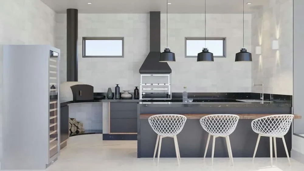 Área gourmet integrada com design sofisticado e acabamentos de alto padrão, ideal para entretenimento.