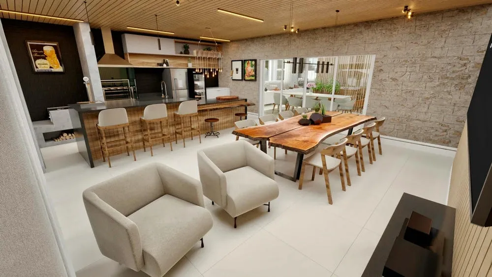 Área gourmet de uma casa de alto padrão com mesa de madeira rústica, bancada e forno a lenha, e uma janela que se abre para o exterior.