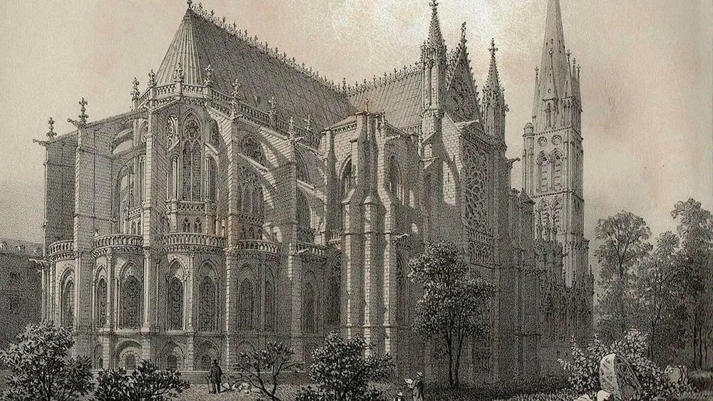Ilustração antiga de uma catedral gótica com arcos, pináculos e contrafortes.