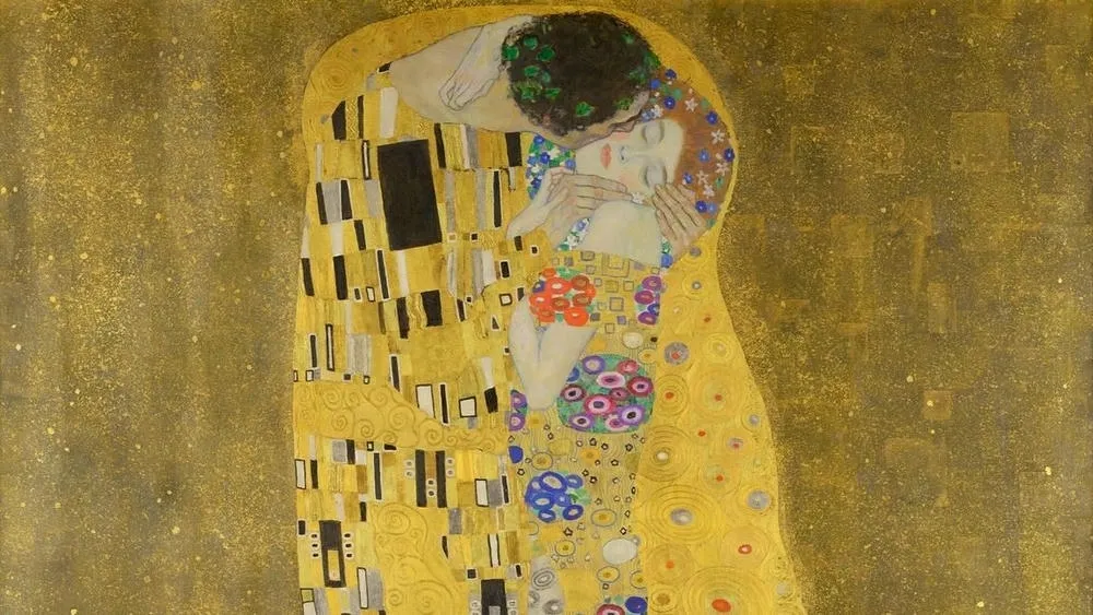 Pintura 'O Beijo' de Gustav Klimt, um exemplo da influência do Art Nouveau na arte.