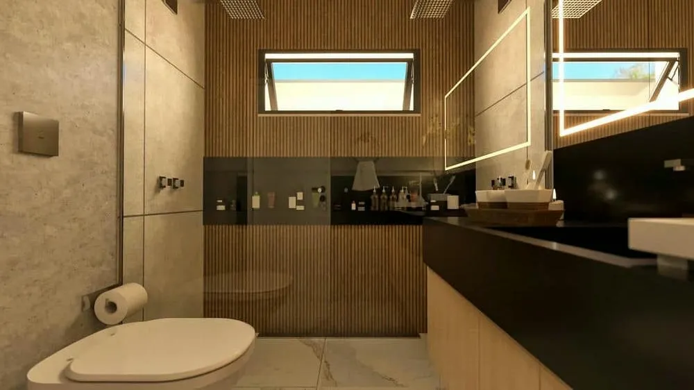 Banheiro moderno com louças elegantes e acabamentos em tons de madeira e preto, do Projeto Marselha.