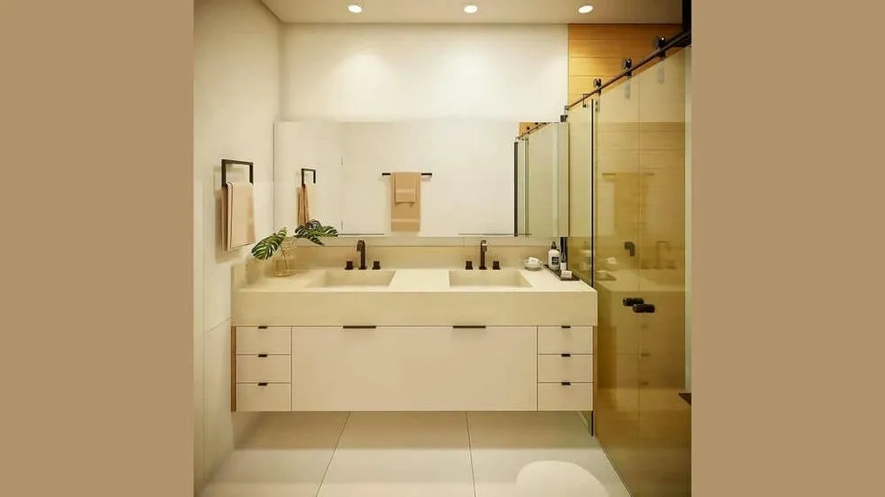 Baño minimalista con toque sofisticado en negro, combinando colores claros con detalles oscuros, del Proyecto Toronto.