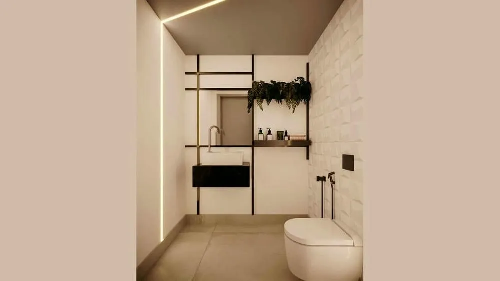 Vista de un baño moderno y lujoso, con detalles en negro y texturas elegantes, del Proyecto Madagascar.