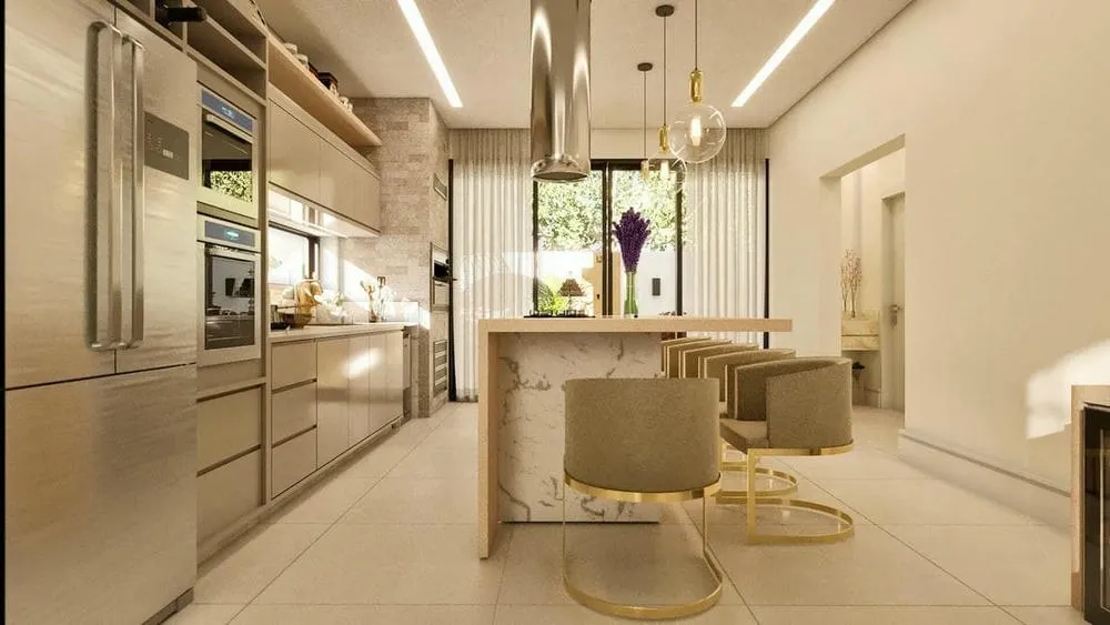 Cocina con isla central y acabados de madera y blanco, demostrando un atractivo estético significativo.