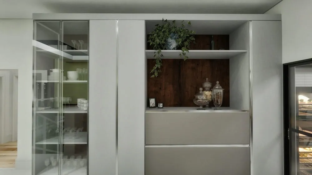 Cocina planificada con estanterías abiertas, ideal para exhibir utensilios y vajilla, como en el Proyecto América.