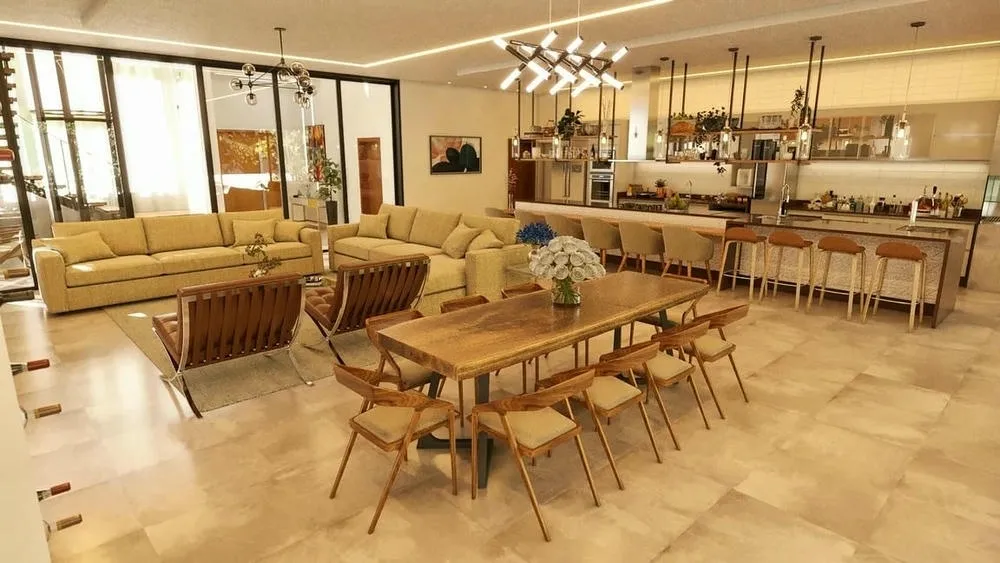 Sala de estar y cocina integradas en un ambiente amplio y lujoso, con muebles modernos e iluminación sofisticada.