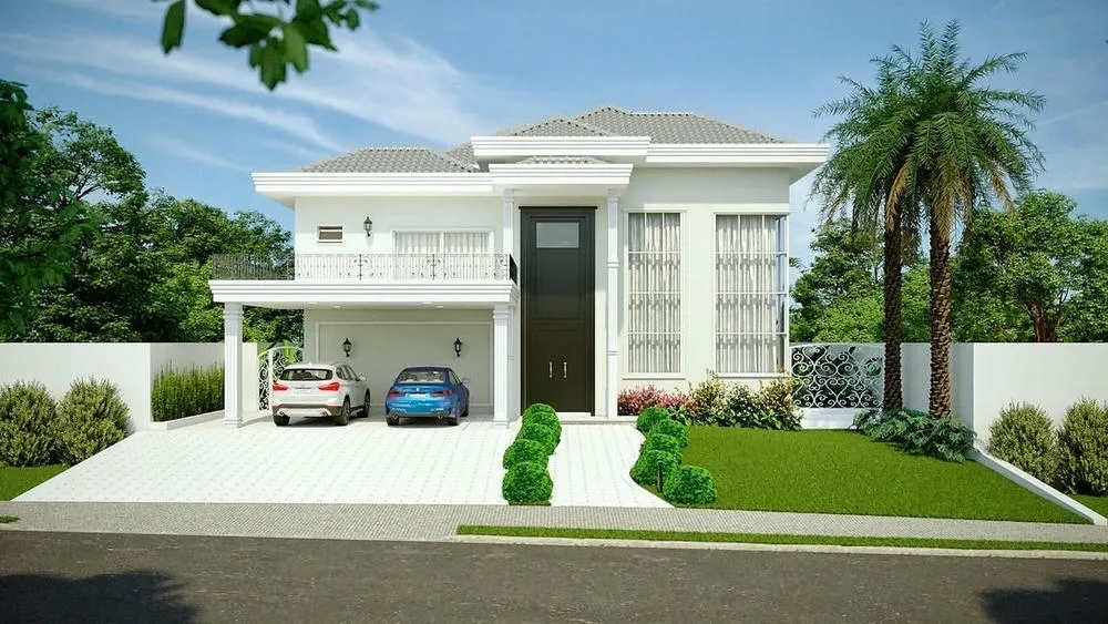 Classic house with a facade in light tones and ornate details, conveying elegance.
