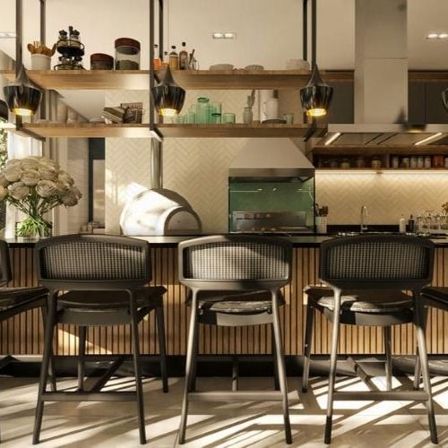 A complete and modern gourmet space, with barbecue area and dining table, ideal for leisure moments.
