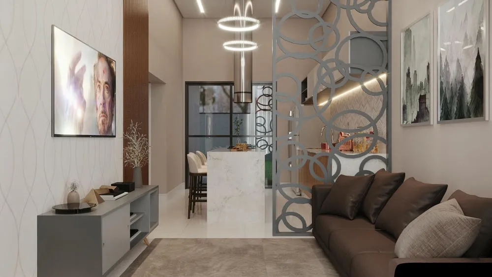 Sala de estar e cozinha integradas em um ambiente de conceito aberto, com cores claras e muita luz natural.