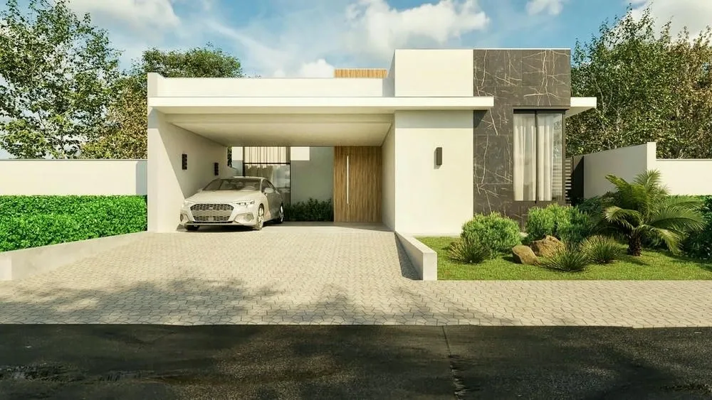 Casa de una planta con platabanda y detalles en mármol oscuro, un coche en el garaje. La platabanda es una extensión de la pared que esconde la estructura del techo.