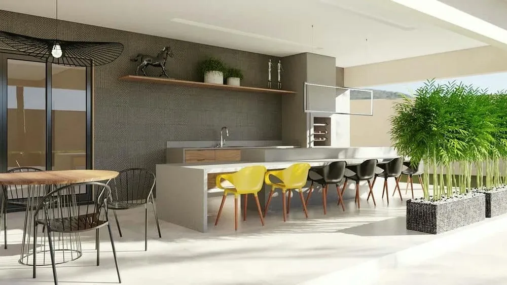 Covered and well-ventilated gourmet space, ideal for the tropical climate and with design that prioritizes comfort.
