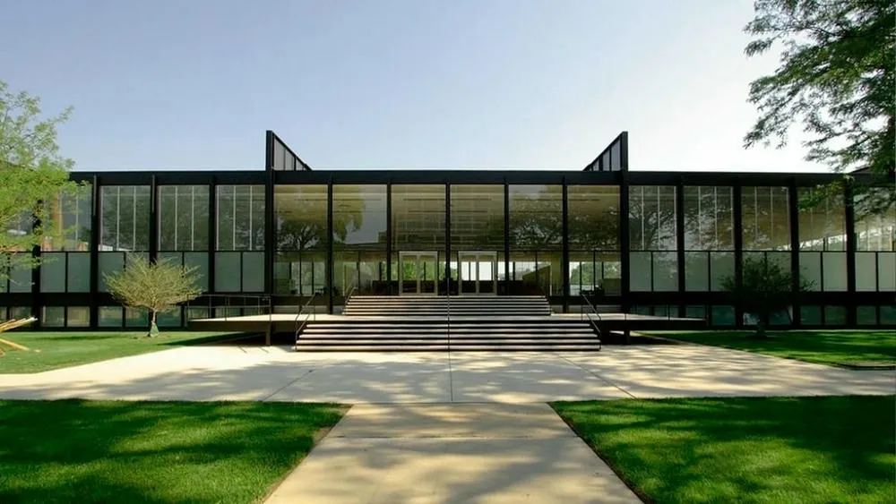 Exterior view of Crown Hall, with its glass and steel facade and pillars.