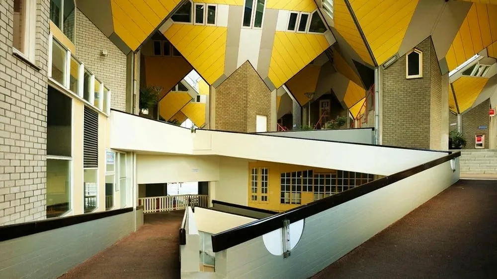 View from inside a cube house, showing the inclined interior and space utilization.