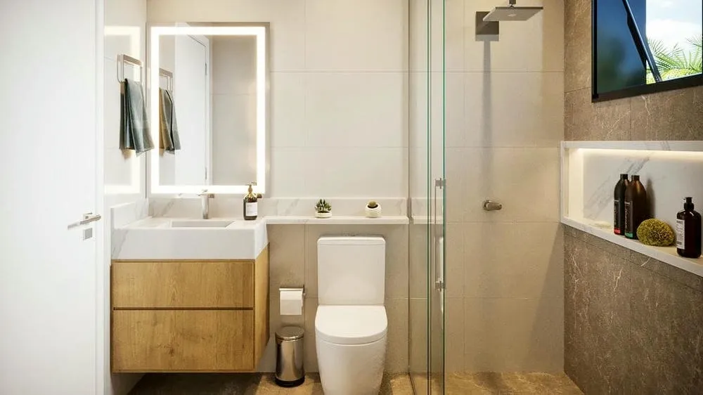 Detalles de un baño moderno y minimalista, con foco en acabados finos y organización, del Proyecto Malta.