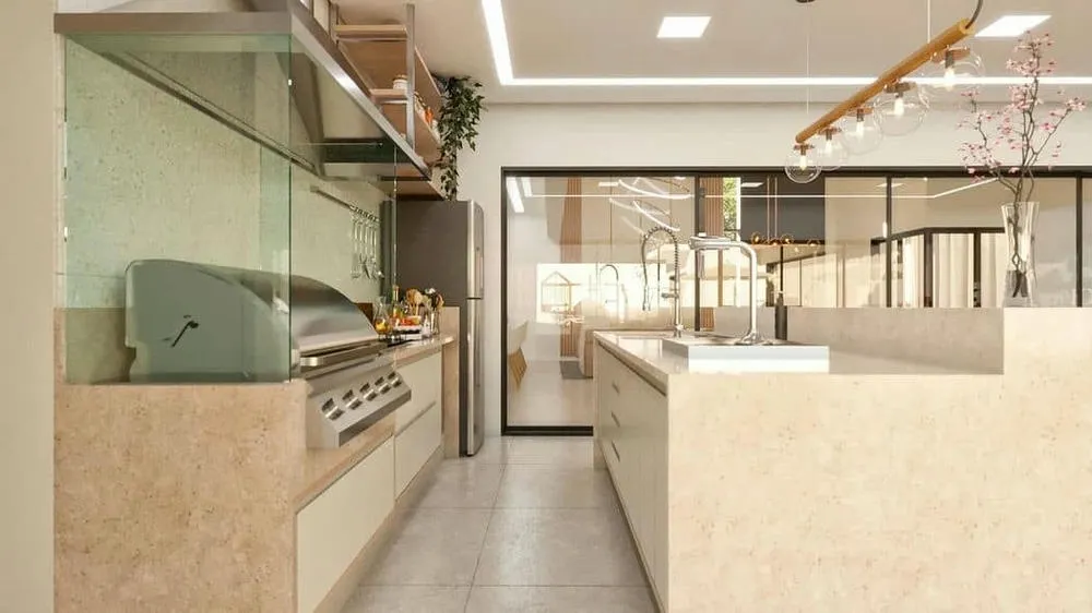 Espacio gourmet amplio y lujoso, con acabados de alto nivel e integración perfecta con el área exterior.