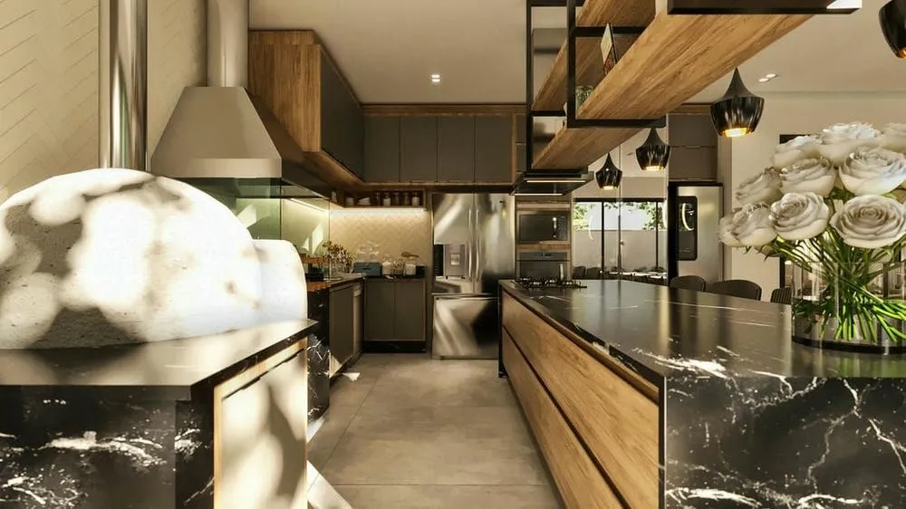 Espacio gourmet lujoso con áreas integradas y acabados de alto nivel, ideal para entretenimiento.