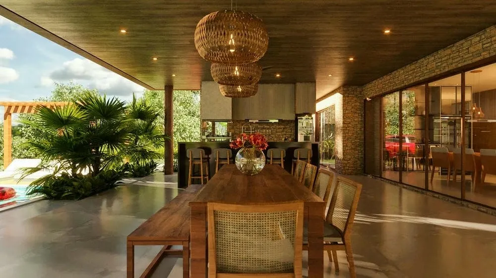Espacio gourmet lujoso con piscina integrada y amplia área de convivencia, ideal para entretenimiento.
