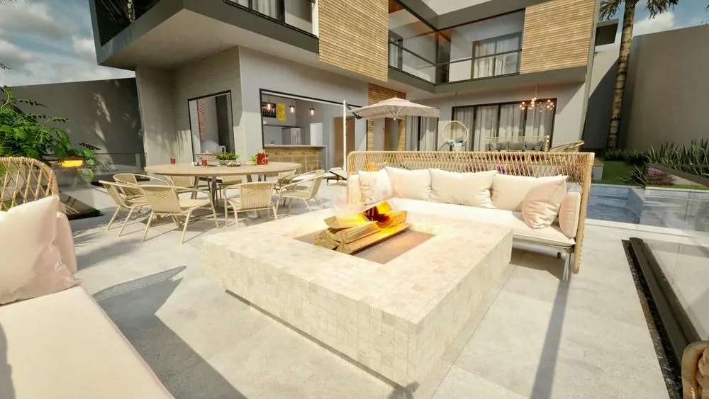 Fire pit near the pool and gourmet area, from ArchShop's Bali Project, ideal for entertaining.