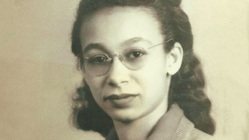 Sepia portrait of Georgia Louise Harris Brown wearing glasses.