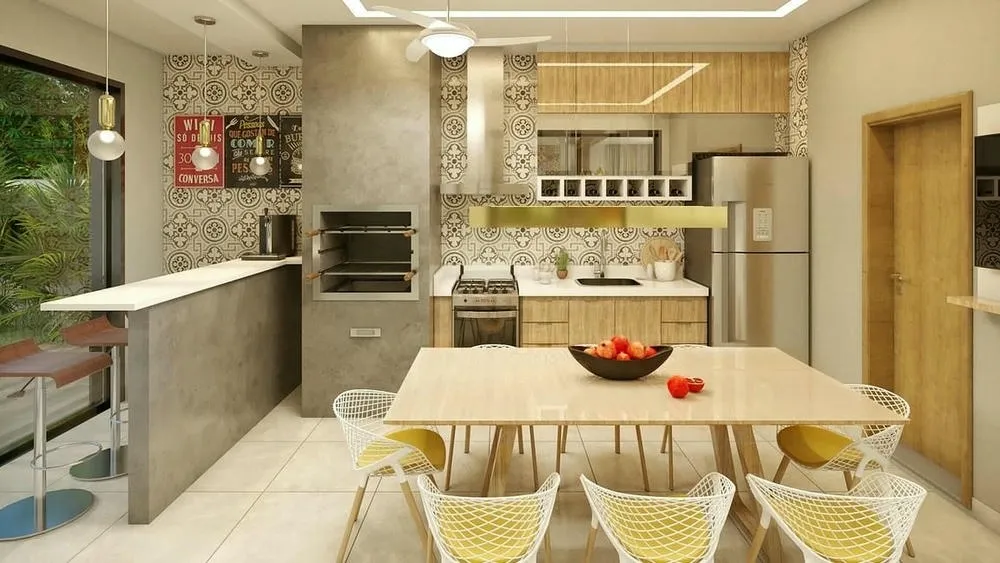 Gourmet area of the Dublin Project, bright and airy, with counter, grill, and decorated tiles, connected to the pool leisure area.