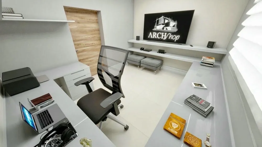 Home office organizado com mesa limpa, prateleiras e uma televisão, minimizando distrações.