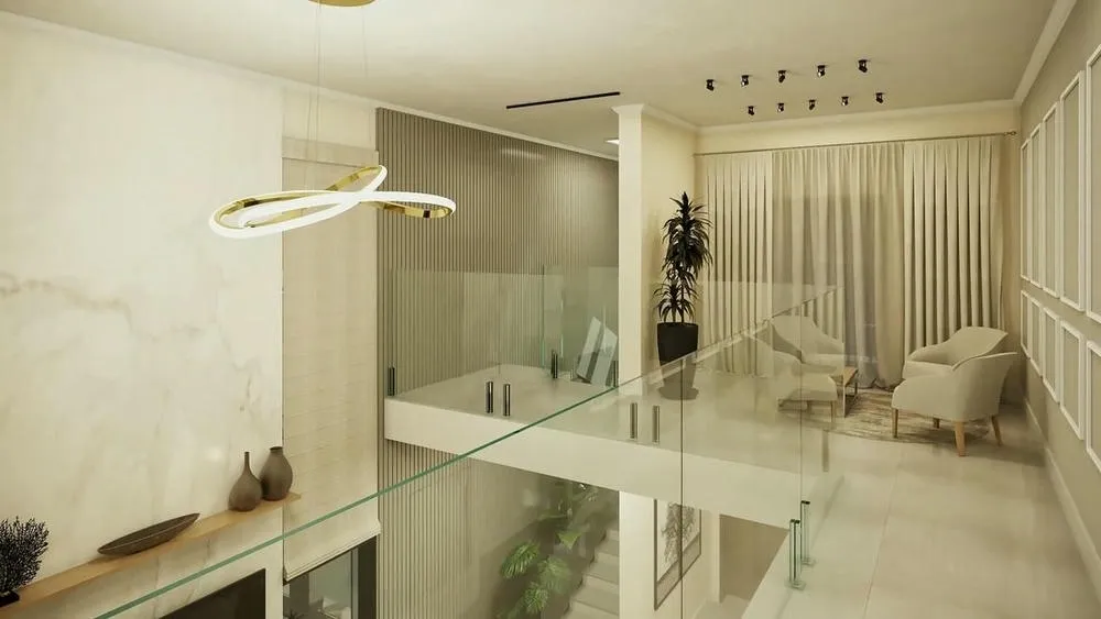 Lámpara colgante moderna en una sala de estar con entrepiso, destacando la iluminación decorativa.