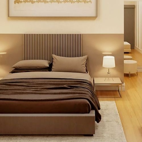 Iluminación acogedora en un dormitorio moderno con cama y lámparas de mesa.