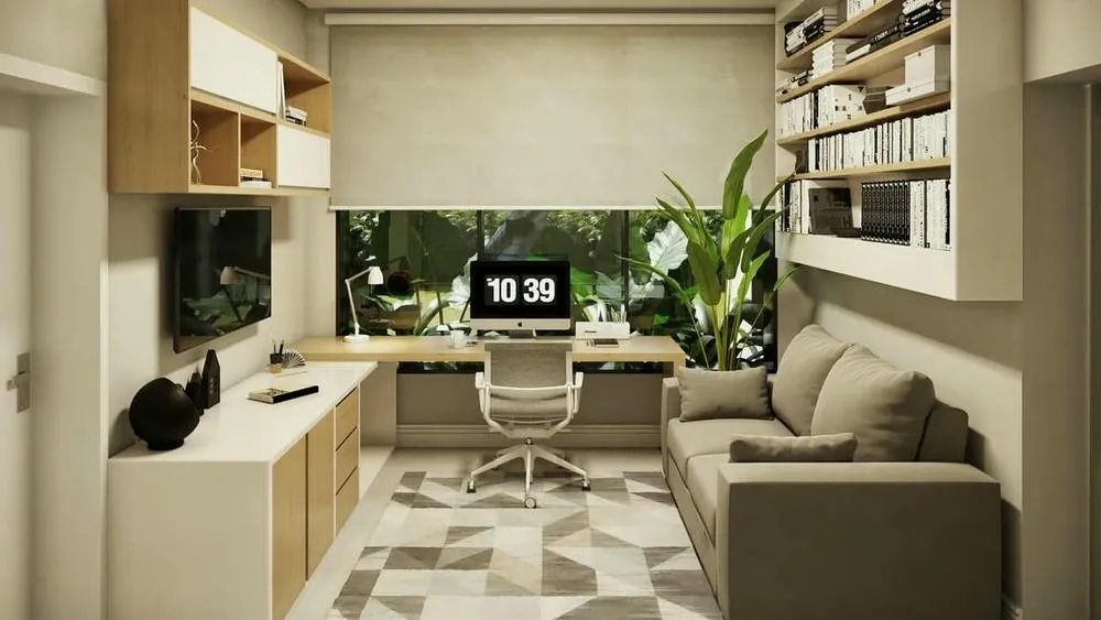 Oficina en casa con iluminación general proveniente de la ventana y lámparas, creando un ambiente de trabajo claro.