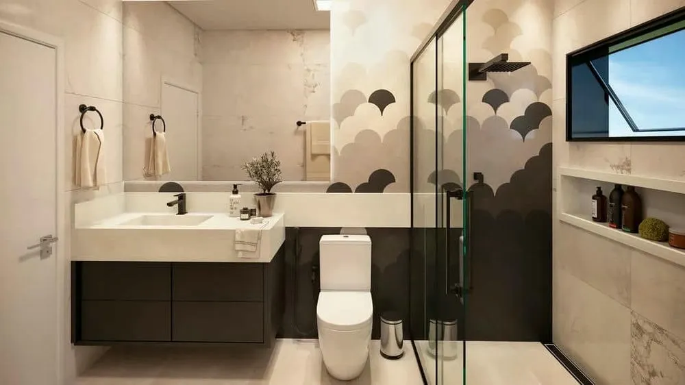 Bathroom with a light look and natural elements, combining light tones and black details, from the Lisbon Project.