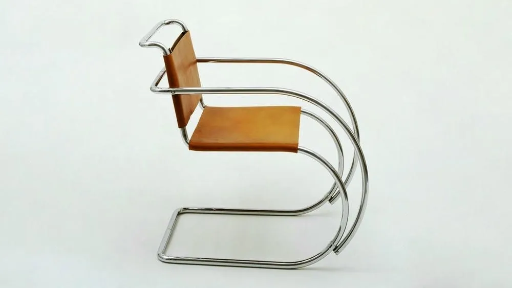 The MR Chair, with its chrome steel structure and leather upholstery.