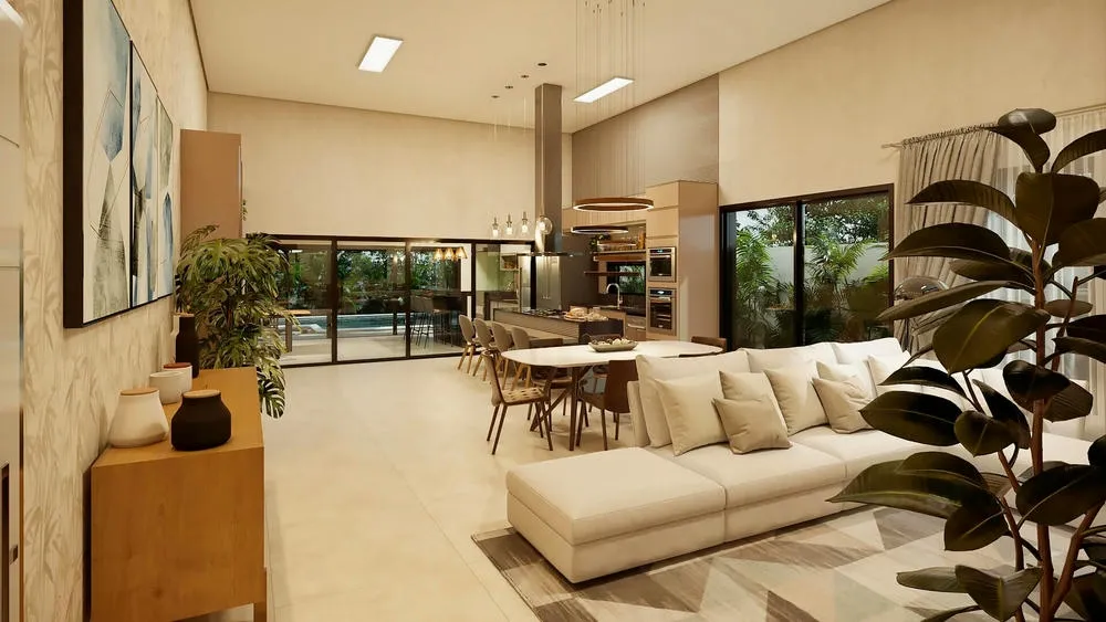 Modern kitchen island in open concept, integrating living and dining room in a fluid environment.