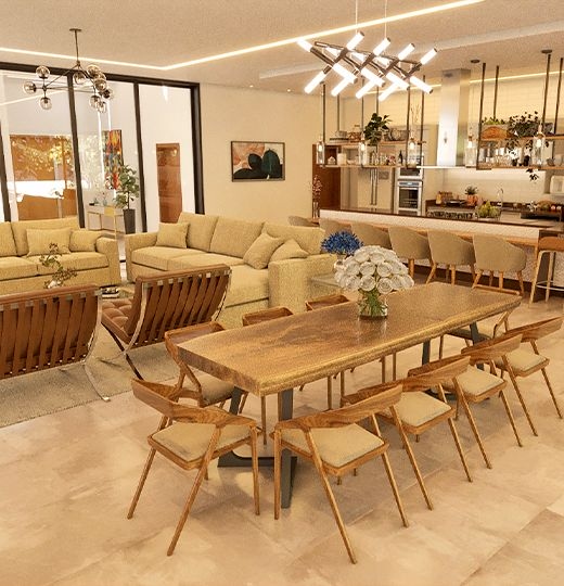 A living room, dining room, and kitchen integrated in an open concept, with sofas, dining table, and kitchen island, enhancing the spaciousness of the area.