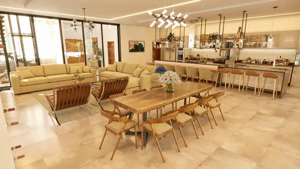 Open concept in a high-end house, integrating TV room, dining room, and gourmet kitchen with large glass panels.