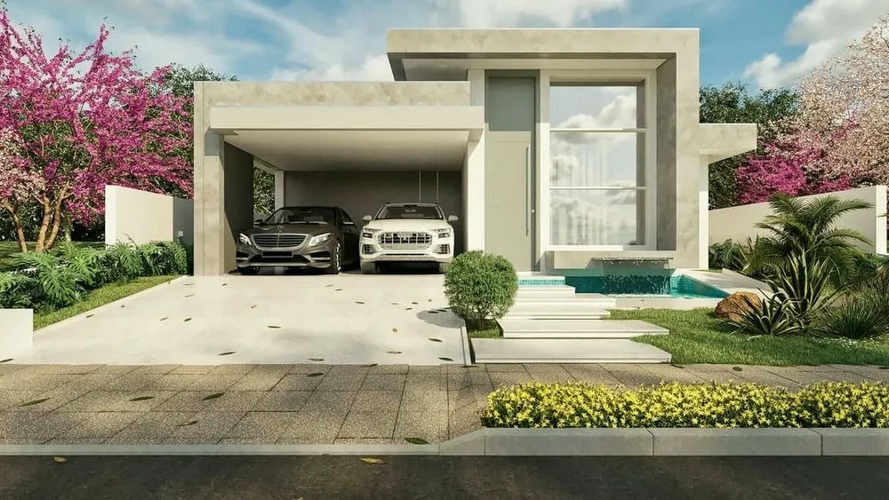 Casa moderna con platabanda blanca, coche en el garaje y detalles en paisajismo. La platabanda crea una transición armoniosa y oculta el techo.