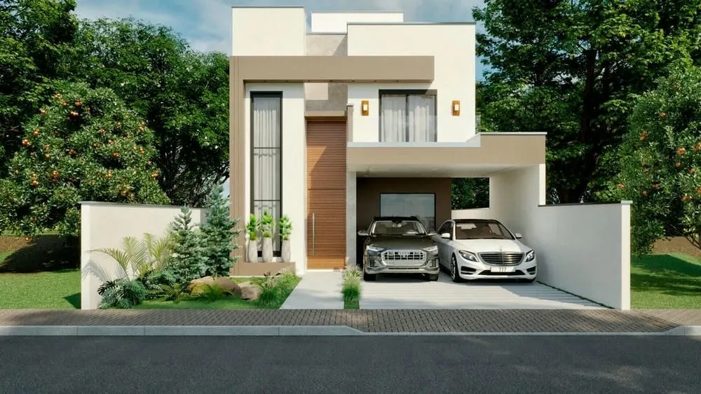 Sobrado com platibanda em tons neutros, garagem para dois carros e vegetação na frente. A platibanda contribui para a estética moderna e clean da construção.