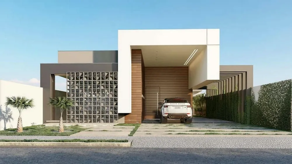 Sala de estar com conceito fechado, tons neutros e iluminação aconchegante do Projeto Suíça.