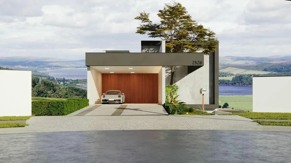 Proyecto de casa en declive con área gourmet moderna, integrada al área exterior con barbacoa.