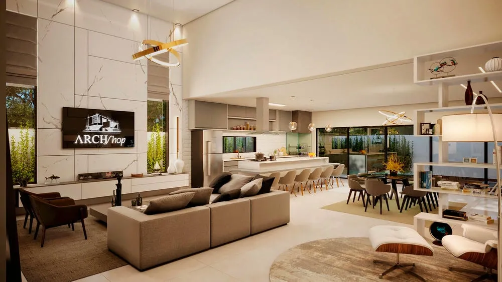 Sala de estar y cocina gourmet integradas en un proyecto con concepto abierto, con mobiliario elegante y tonos neutros.