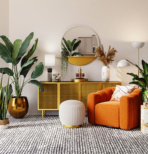 Sala de estar moderna con sofá gris, mesa de centro de madera y plantas, destacando las tendencias de arquitectura y decoración.