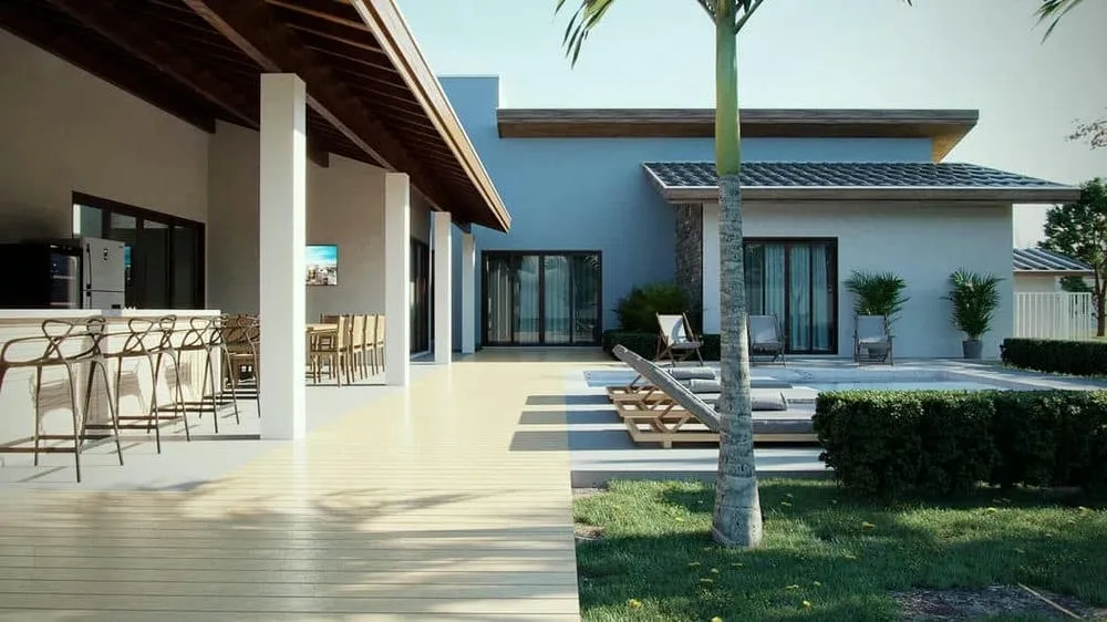 Spacious and rustic gourmet veranda, with natural elements and landscaping view.