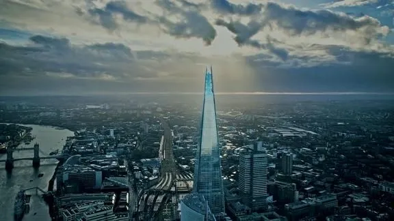 The Shard skyscraper in London, with its glass and steel facade, an icon of contemporary architecture.