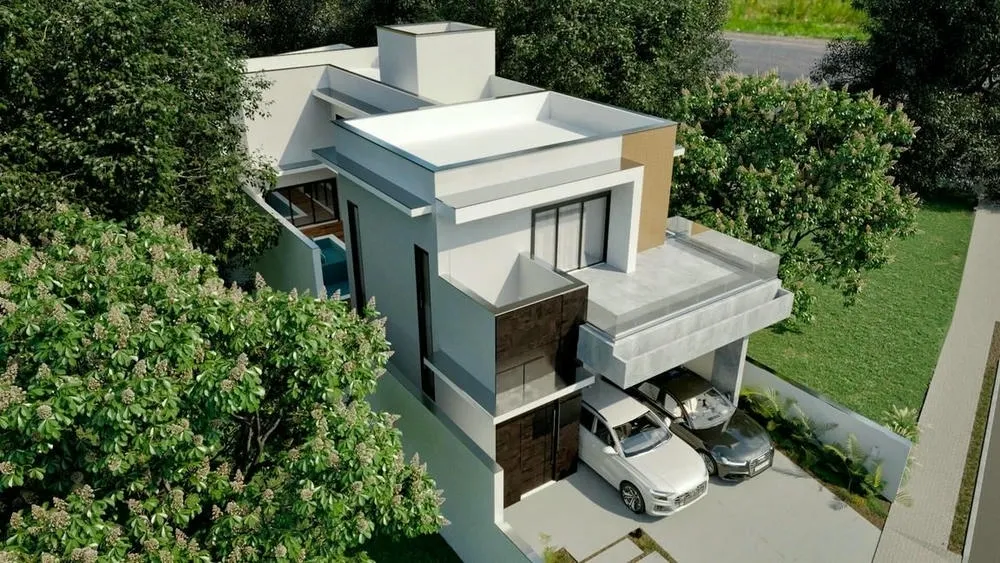 Night view of an uphill two-story house, with outdoor lighting and illuminated pool.